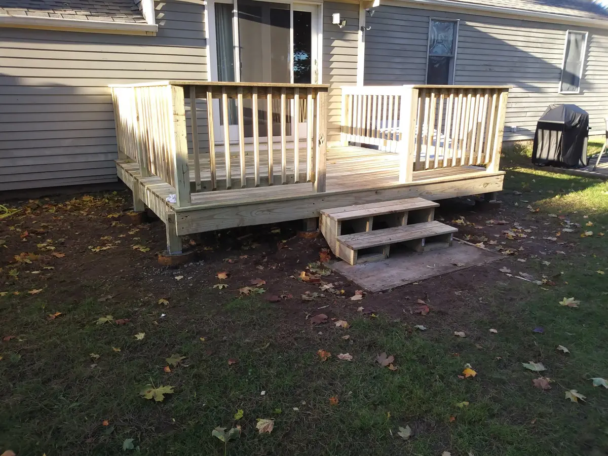 Small deck with railing and steps