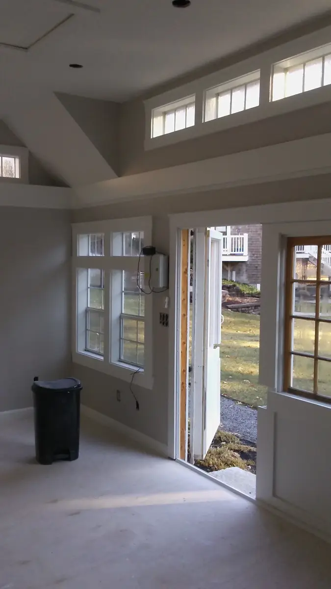 Finished room with French doors and transom windows